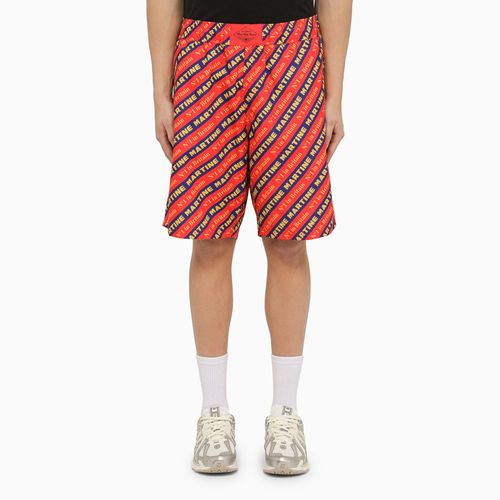 Red Bermuda shorts with logo print - Martine Rose - Modalova