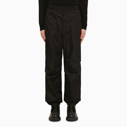 Re-Nylon trousers with logo triangle - Prada - Modalova