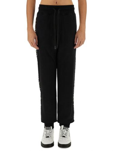 Jogging Pants With Logo - Versace Jeans Couture - Modalova