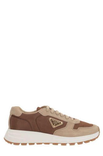 Enamel-triangle Lace-up Sneakers - Prada - Modalova