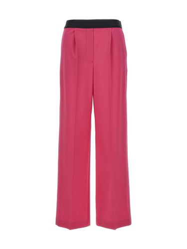 MSGM Pants With Front Pleats - MSGM - Modalova