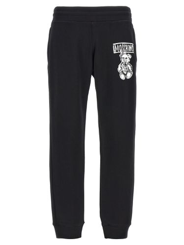 Moschino Logo Print Joggers - Moschino - Modalova