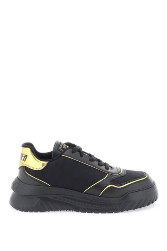 Odissea Chunky Leather Sneakers - Versace - Modalova