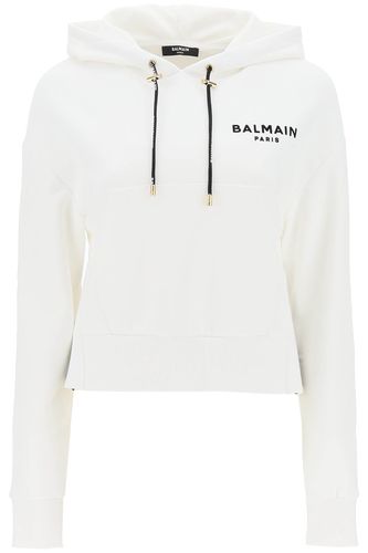 Cropped Sweatshirt With Flocked Logo Print - Balmain - Modalova