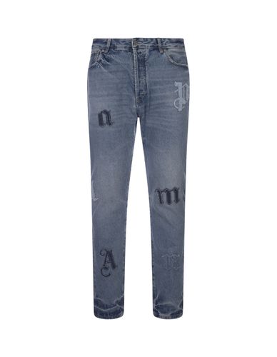Slim Fit Jeans In Denim With Application - Palm Angels - Modalova