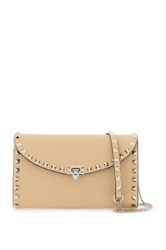 Garavani Rockstud Foldover Top Crossbody Bag - Valentino Garavani - Modalova