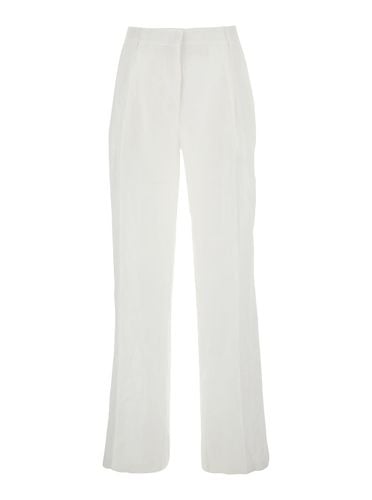 Pants With Belt Loops And Pence Details In Linen Woman - SEMICOUTURE - Modalova