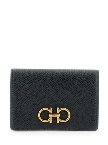 Gancini Wallet With Button Closure In Leather Woman - Ferragamo - Modalova