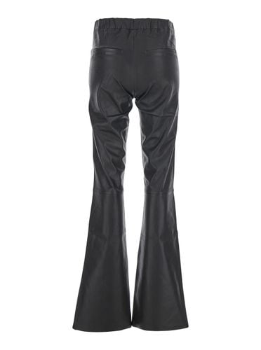 Izzy Flared Pants In Leather Woman - ARMA - Modalova