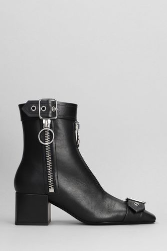 Low Heels Ankle Boots In Leather - Courrèges - Modalova