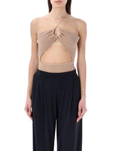 Ribbed Knit Sleeveless Bodysuit With Cut - ANDREĀDAMO - Modalova