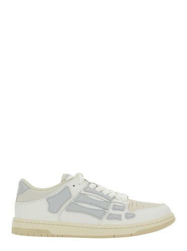 Skel Top Low Top Sneakers With Logo Patch On The Tongue And Logo Lettering On The Heel In Leather Man - AMIRI - Modalova