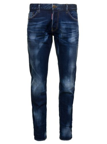 Slim Jeans With Logo Patch And Faded Effect In Stretch Cotton Denim Man - Dsquared2 - Modalova