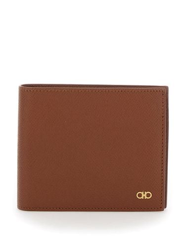 Micro Gancini Bi Fold Wallet With Logo In Hammered Leather Man - Ferragamo - Modalova