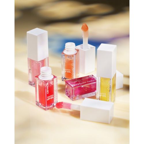 Glossing Glow aceite con color para labios tono 010 - Keep It Juicy 4 ml - Catrice - Modalova
