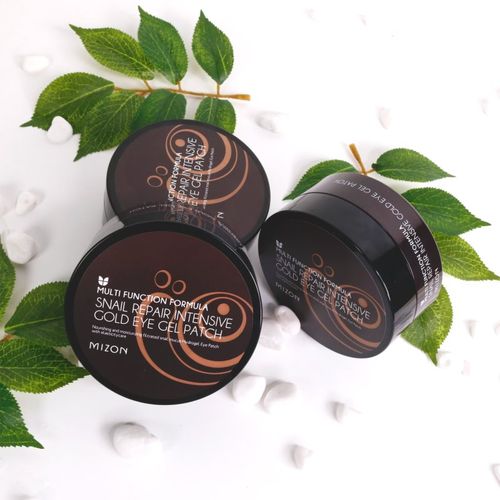Multi Function Formula Snail mascarilla antiojeras y antibolsas con oro 60 x 1.4 g - Mizon - Modalova
