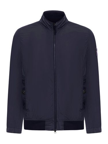 WIND JACKET WITH COMPASS APPLICATION - Man - Stone Island - Modalova