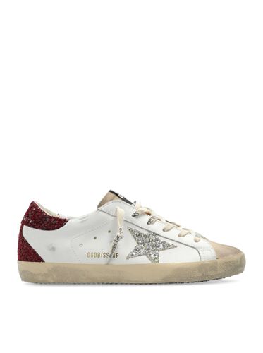 SuperStar distressed leather sneakers - Woman - Golden Goose Deluxe Brand - Modalova