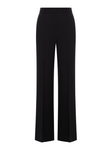 VISCOSE AND VIRGIN WOOL FLARE TROUSERS - Woman - Toteme - Modalova