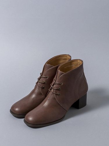 Lace-up Ankle Boots in Brown - heenn - Modalova