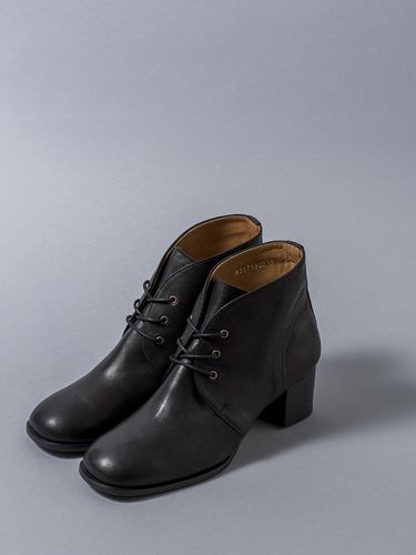 Lace-up Ankle Boots in Black - heenn - Modalova