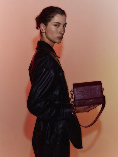 Mini Bold Chain Bag in Deep Burgundy - JAIGURU DEVAOM - Modalova