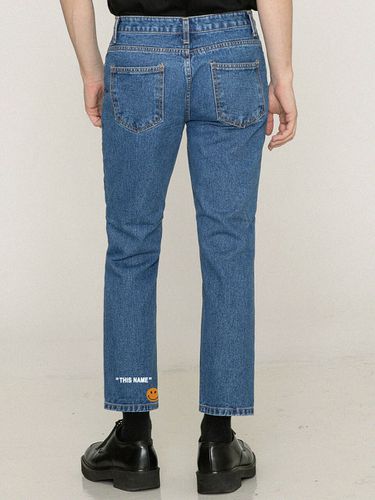 Smile Graphic Tapered Denim Pants - GRAVER - Modalova