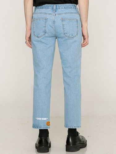 Smile Graphic Tapered Denim Pants - GRAVER - Modalova