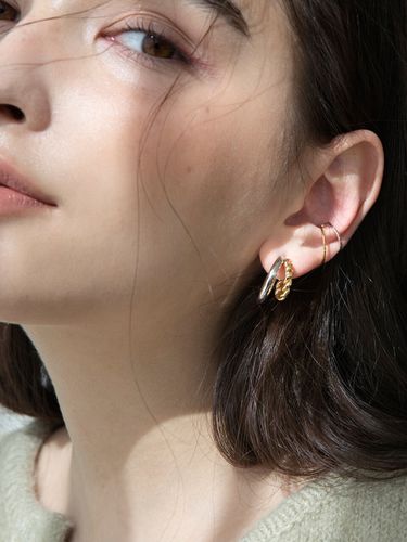 Plain twist earrings - FANTASTIC PLANET - Modalova