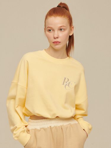 RCC Logo Cropped Sweatshirt (Light Yellow) - ROCCI ROCCI - Modalova