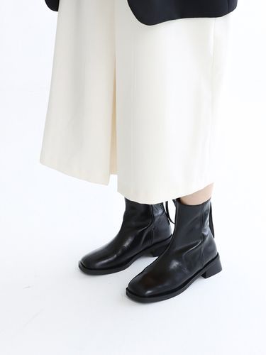 Tan Ankle Boots_Black - MOL:pin - Modalova