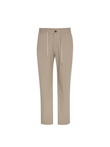 Tapered Banding Pants_Beige - SOLEW - Modalova