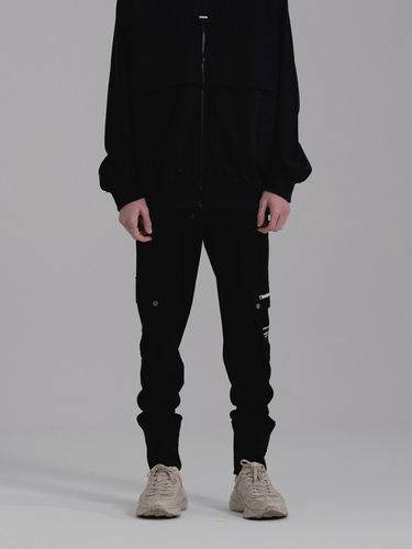 UNNORM Jersey Cargo Pants _ Black - UNNORM IS DEAD - Modalova