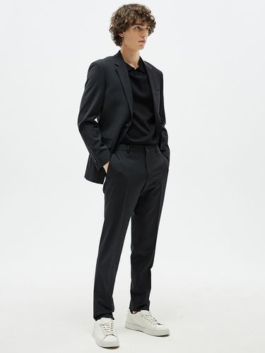 Tapered Stretch Slacks Black - EZIO - Modalova