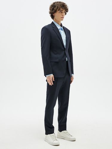 Tapered Stretch Slacks Navy - EZIO - Modalova