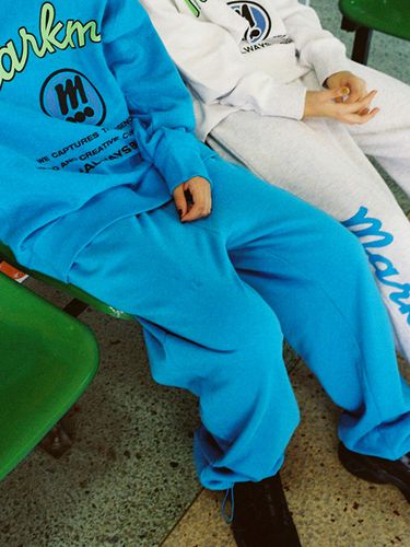 Smiley Logo Sweatpants _ Blue - MARKM - Modalova