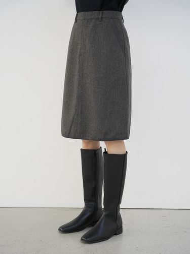 Olivia Trimmed Herringbone Wool Midi Skirt _ - LEIE - Modalova