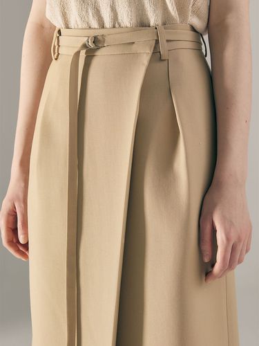 Belted Asymmetric Pleated Skirt_Beige - AVA MOLLI - Modalova