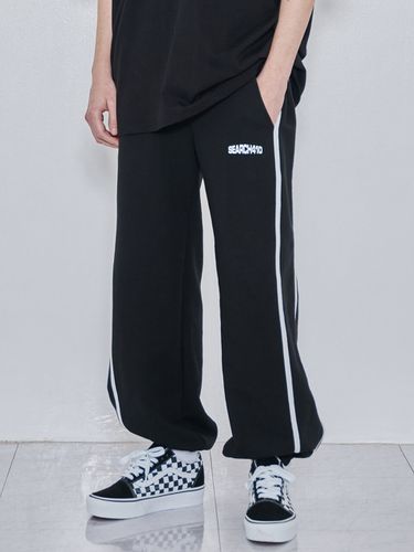 Piping Line One Tuck Jogger Pants () - SEARCH410 - Modalova