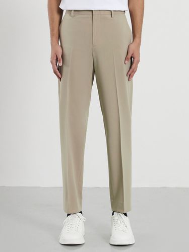 Tapered Fit Hidden Banding No-Tuck Slacks [] - TNGT - Modalova