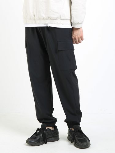 Minimal Cargo Nylon Jogger Pants _ - PEPPERSEASONING - Modalova