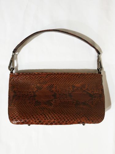 Chain Clutch Bag_Brown - GONI atelier - Modalova