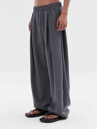 Deep Four Tuck Flow Banded Linen Pants _ - DNSR - Modalova