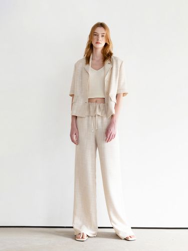 Bending Wide Pants (Beige) - AVA MOLLI - Modalova