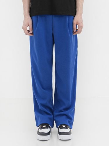 P004 One-Tuck Sweatpants Blue - WAAR FOR MEN - Modalova