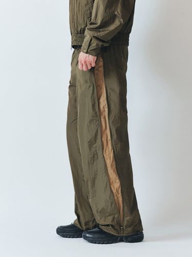 Nylon Two Way Zip Up Pants_Khaki - CITYBREEZE - Modalova