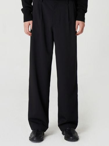 Pleated Side-Adjuster Pants _ Black - 24/7 series - Modalova