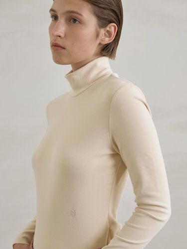 Signature warm-touch turtleneck tee - Atelier Nain - Modalova