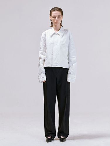 Side Pleats Tapered Leg Pants _ - NUAKLE - Modalova