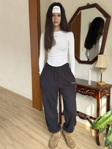 Wool Two-Way Knit Ribbed Pants_Black - INJIACTIVE - Modalova